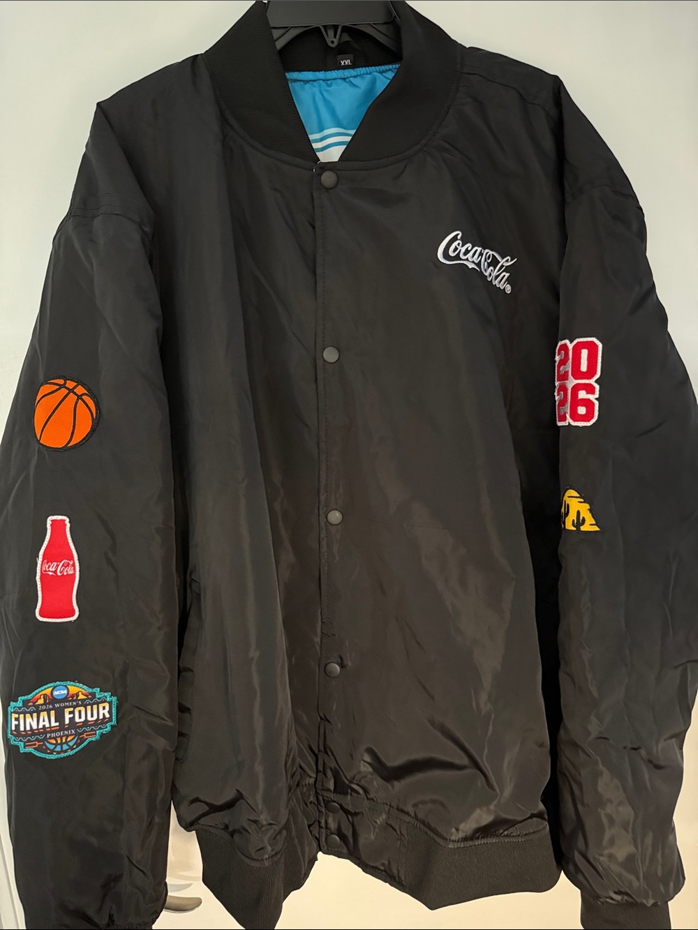 Coca-Cola Black Bomber Jacket with Sports Patches and Blue Lining